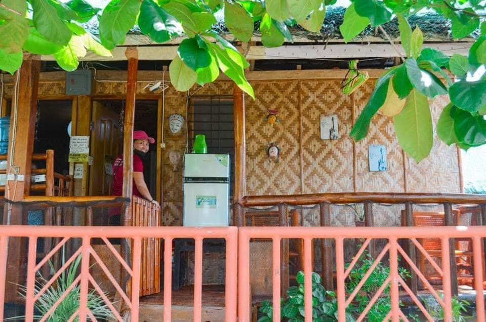Titanic'S Nipa Hut Hostel Moalboal Exterior foto
