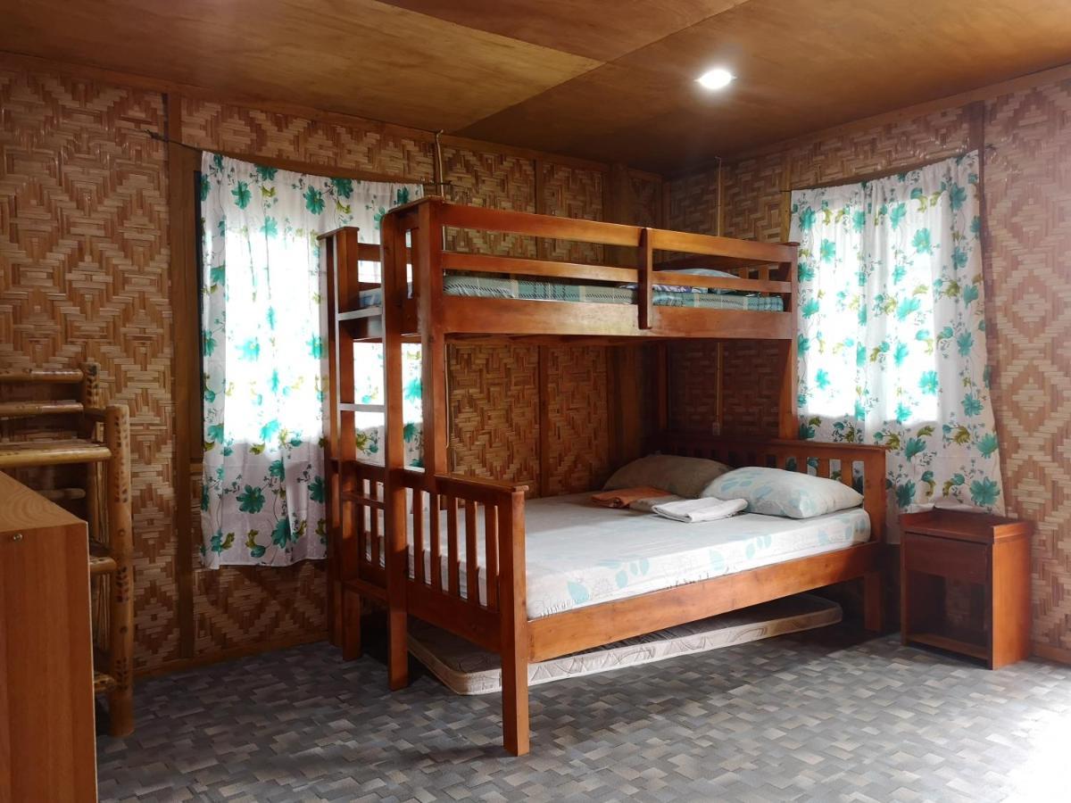 Titanic'S Nipa Hut Hostel Moalboal Exterior foto