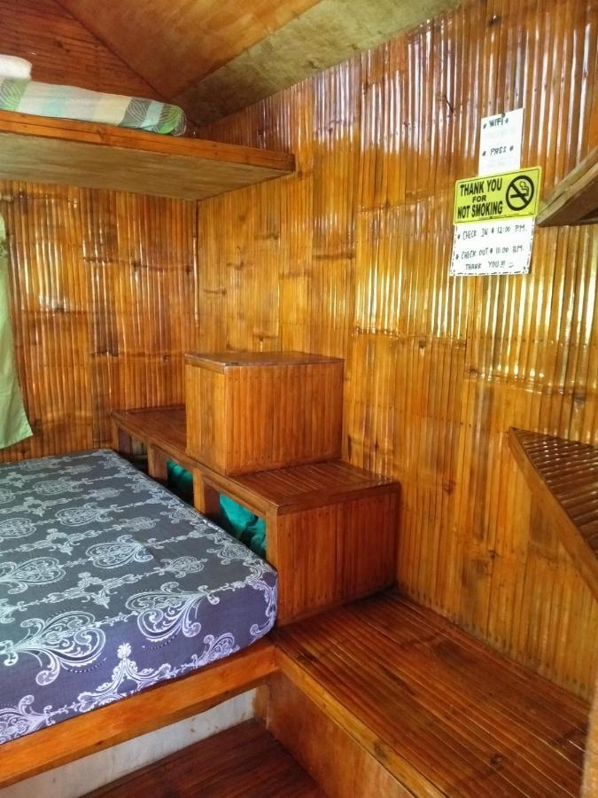 Titanic'S Nipa Hut Hostel Moalboal Exterior foto