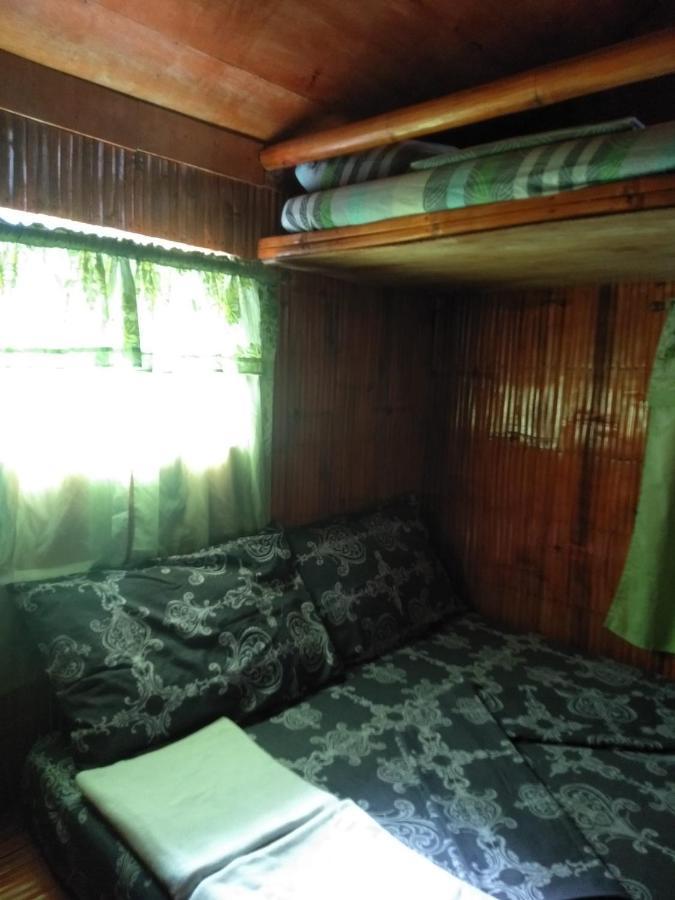 Titanic'S Nipa Hut Hostel Moalboal Exterior foto