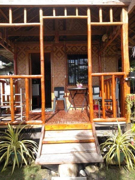 Titanic'S Nipa Hut Hostel Moalboal Exterior foto