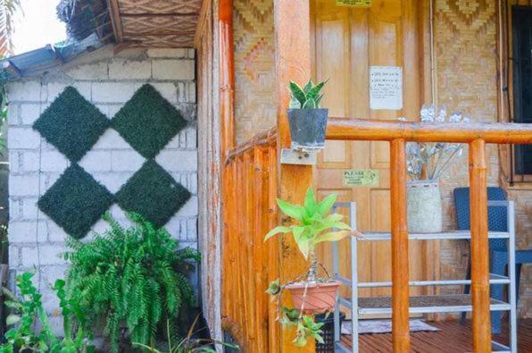 Titanic'S Nipa Hut Hostel Moalboal Exterior foto