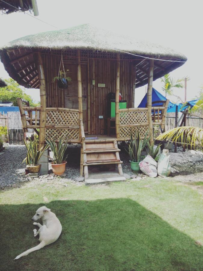 Titanic'S Nipa Hut Hostel Moalboal Exterior foto