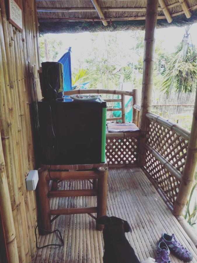 Titanic'S Nipa Hut Hostel Moalboal Exterior foto